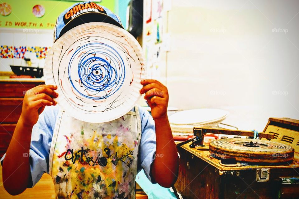 Creating art is way cooler when you use an old record player, markers and paper plates. I love all the swirly lines, dots and circles.