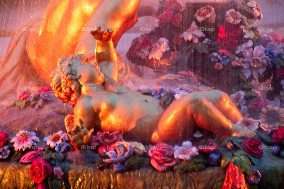 statue of a person in a garden