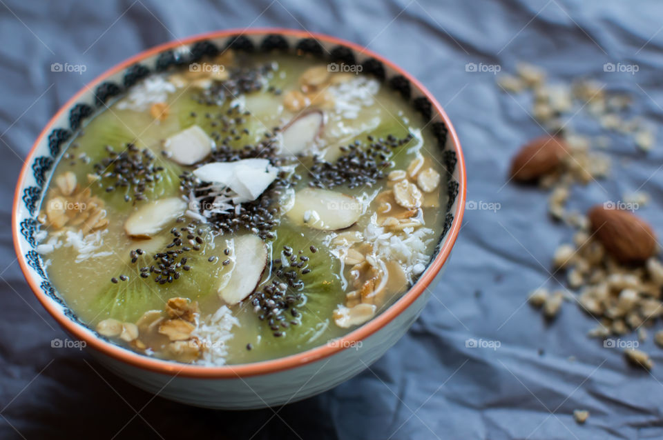 Beautiful green smoothie in bowl