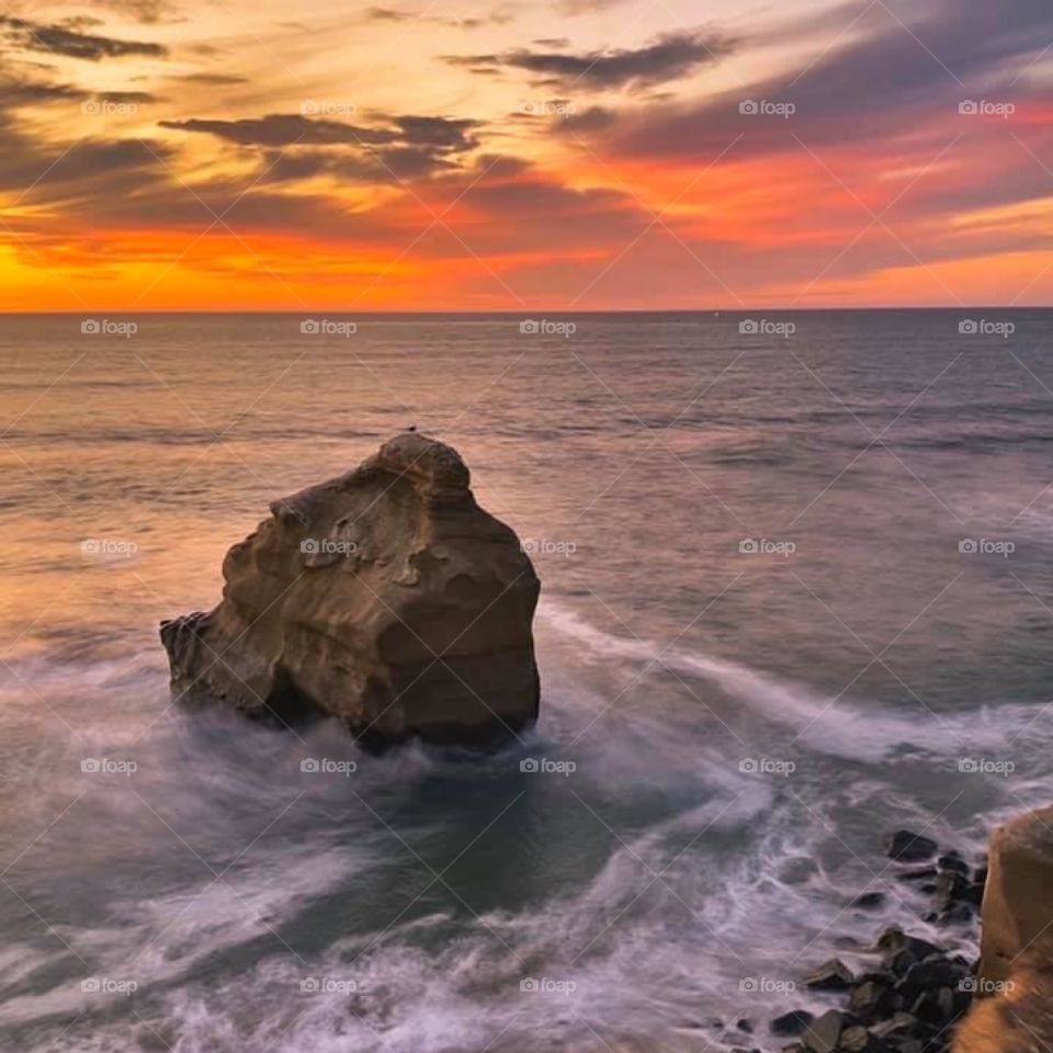 Sunset in the calm sea