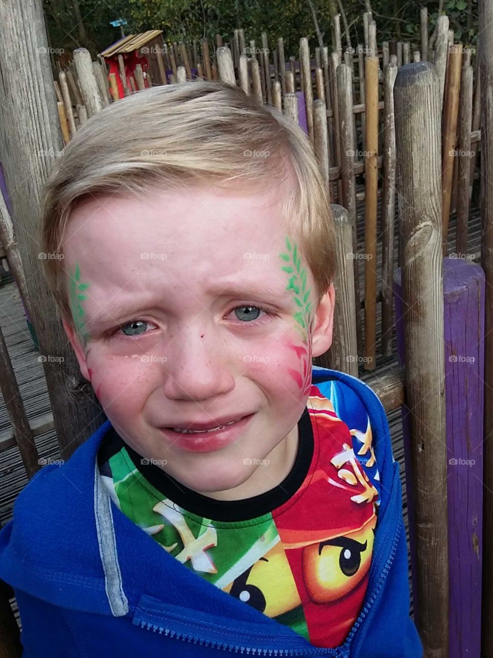 crying face paint boy