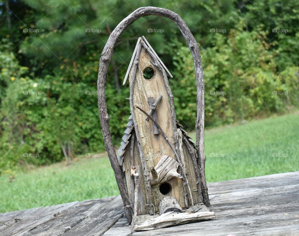wood branch birdhouse