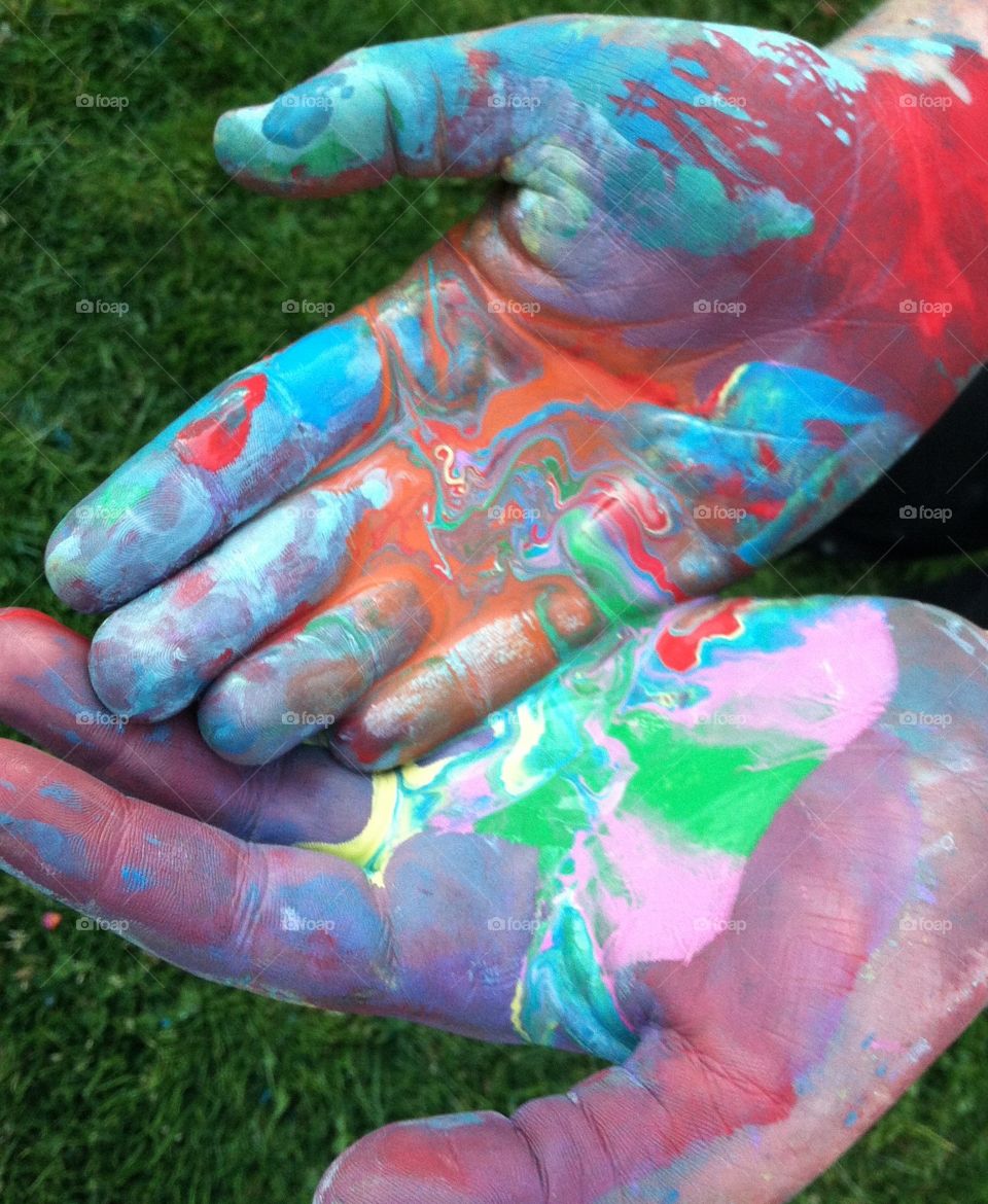 Color My World. A photograph of my friends beautiful hands after our paint war.