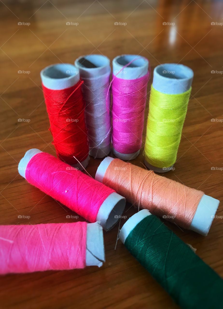 Color thread scrolls on the table 