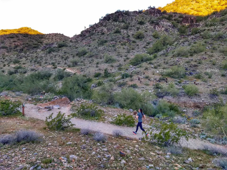 woman running in the desert
