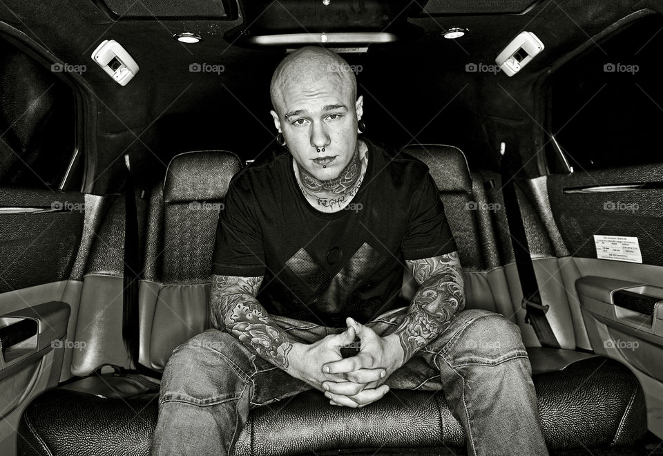 Swedish singer and artist Linus Svenning in a limousine.