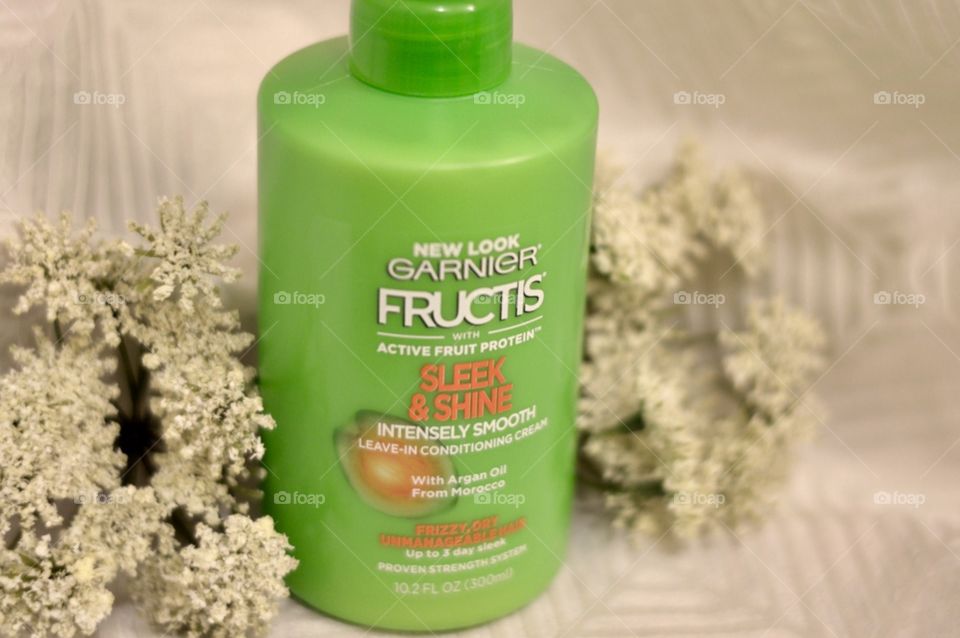 Garnier sleek and shine intensely smooth on a white background