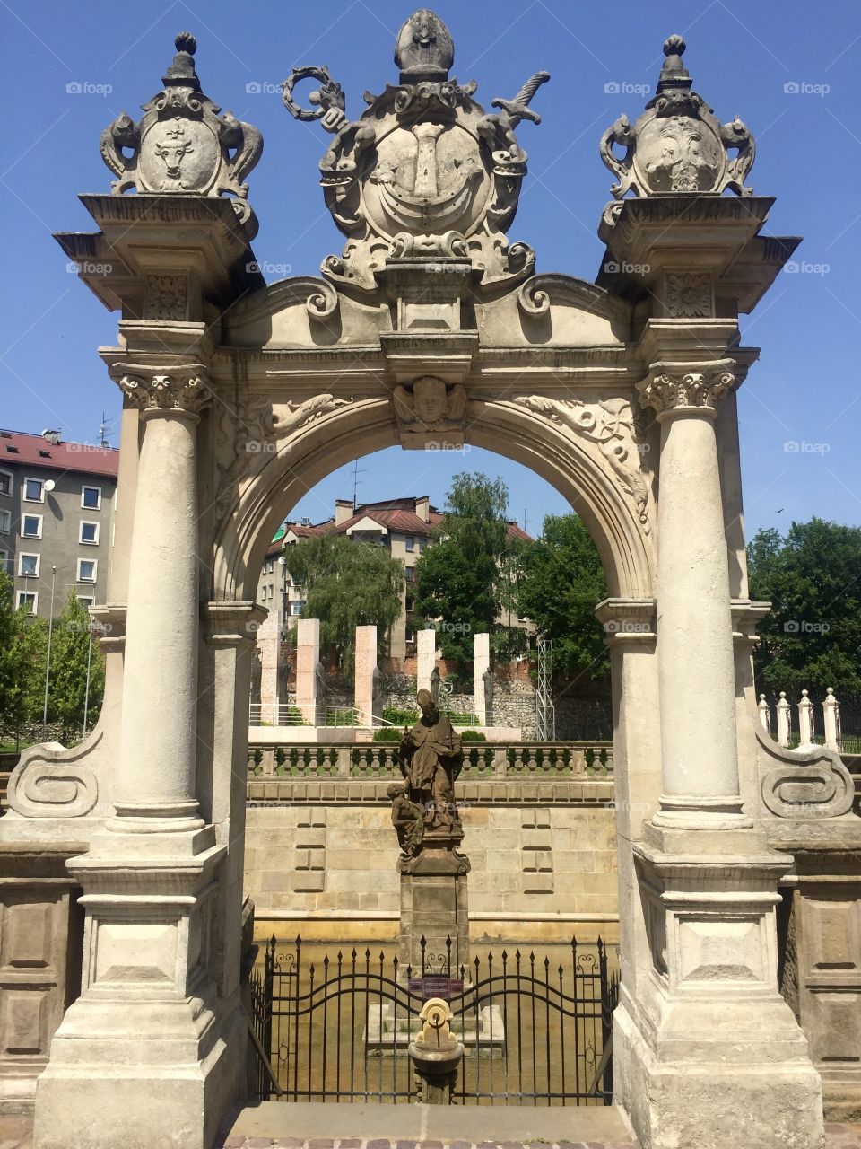 Arch to the fountain in the Church yard