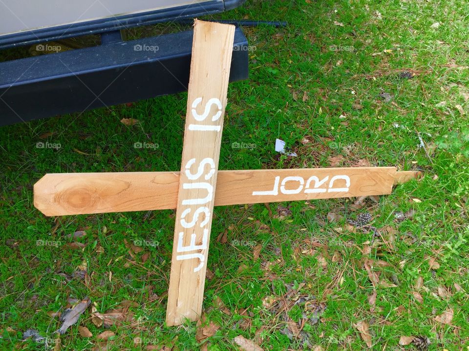 Sign that says Jesus is lord on the cross
