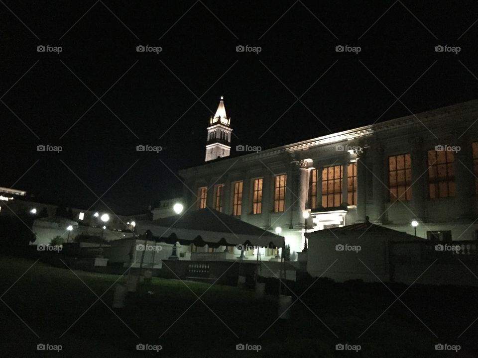 Bears territory . Walking around the UC Berkeley Campus in the middle of the night. The campanile and the library light up the night 