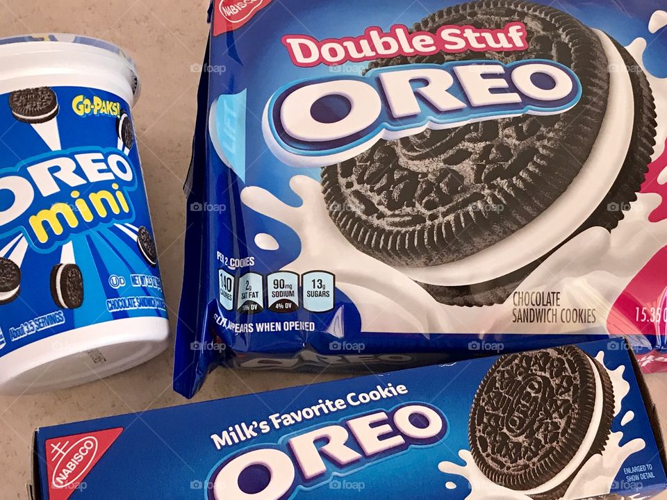 Mini and double stuf Oreo cookies flat lay on a counter top 