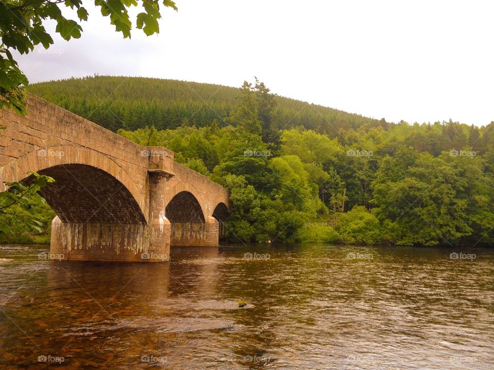 Arch bridge over the river