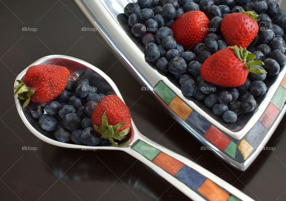blueberries strawberry colorful berries Bowl spoon