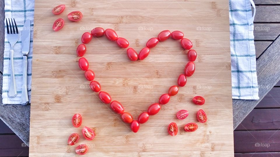 Heart made with tomatos