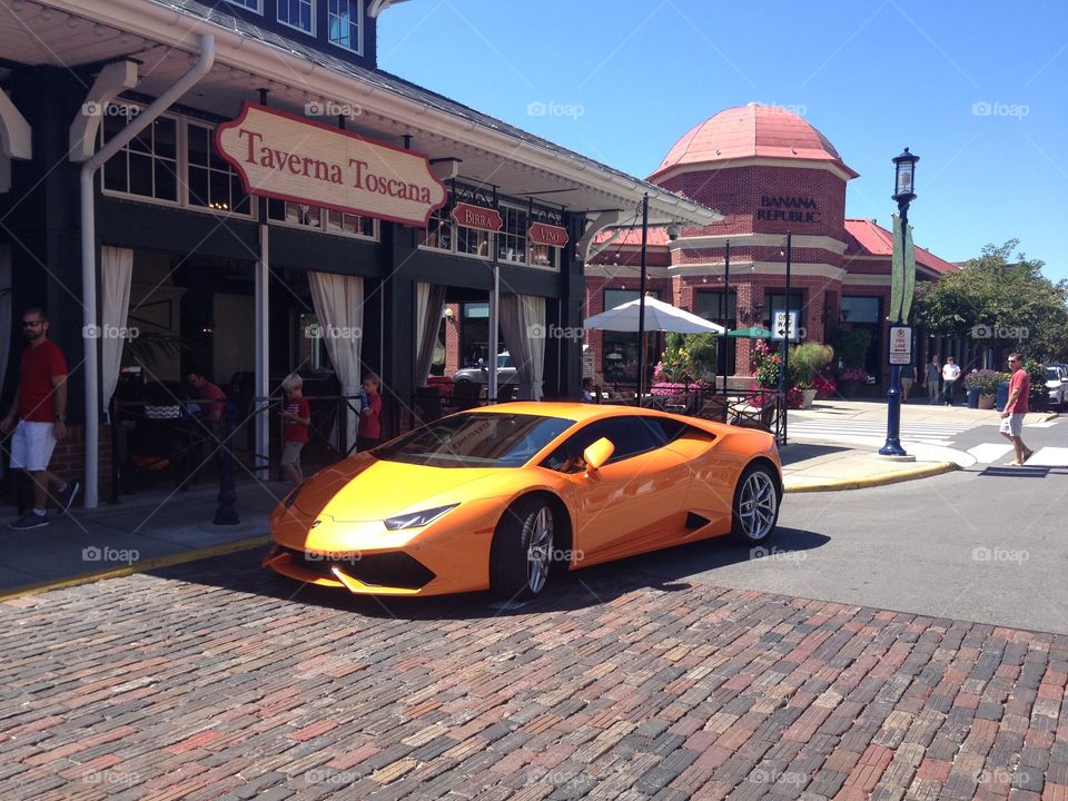 Lamborghini car. Car in front of restaurant