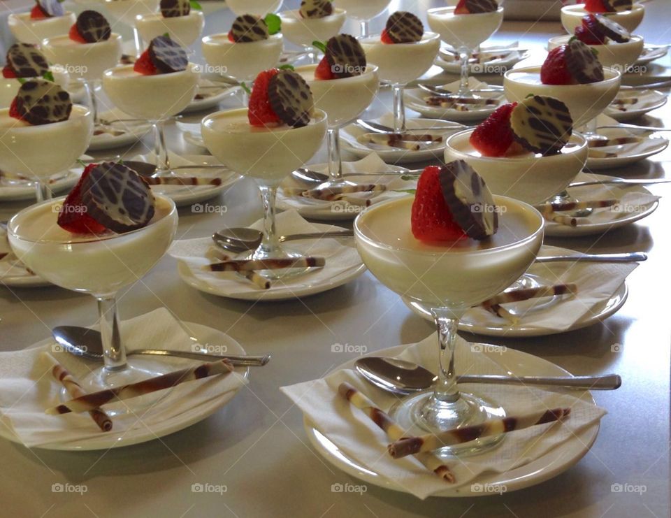 Dessert is served! Yummy pudding with raspberries and chocolate.