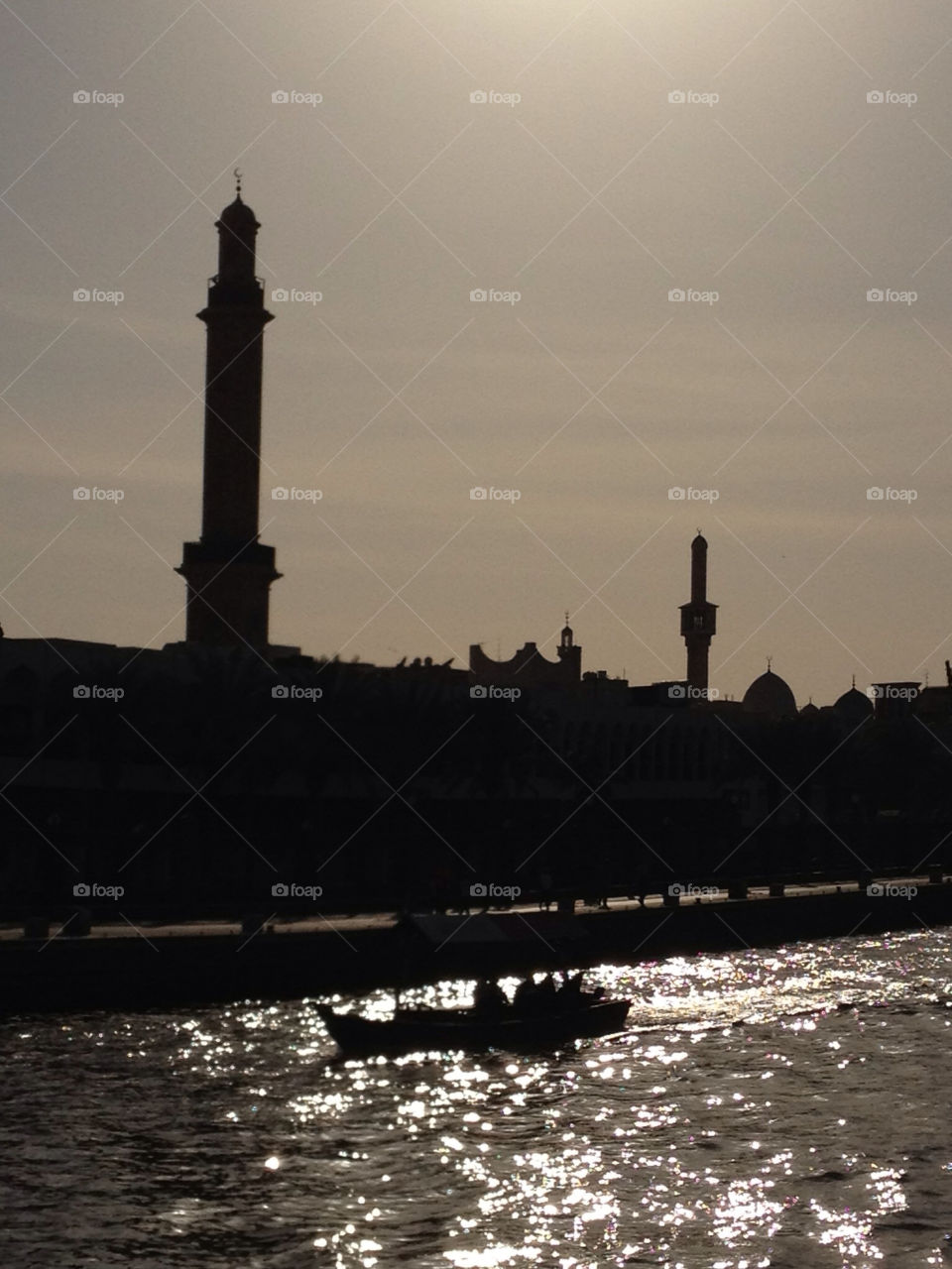 Fisherman in a river in Dubai during to sunset