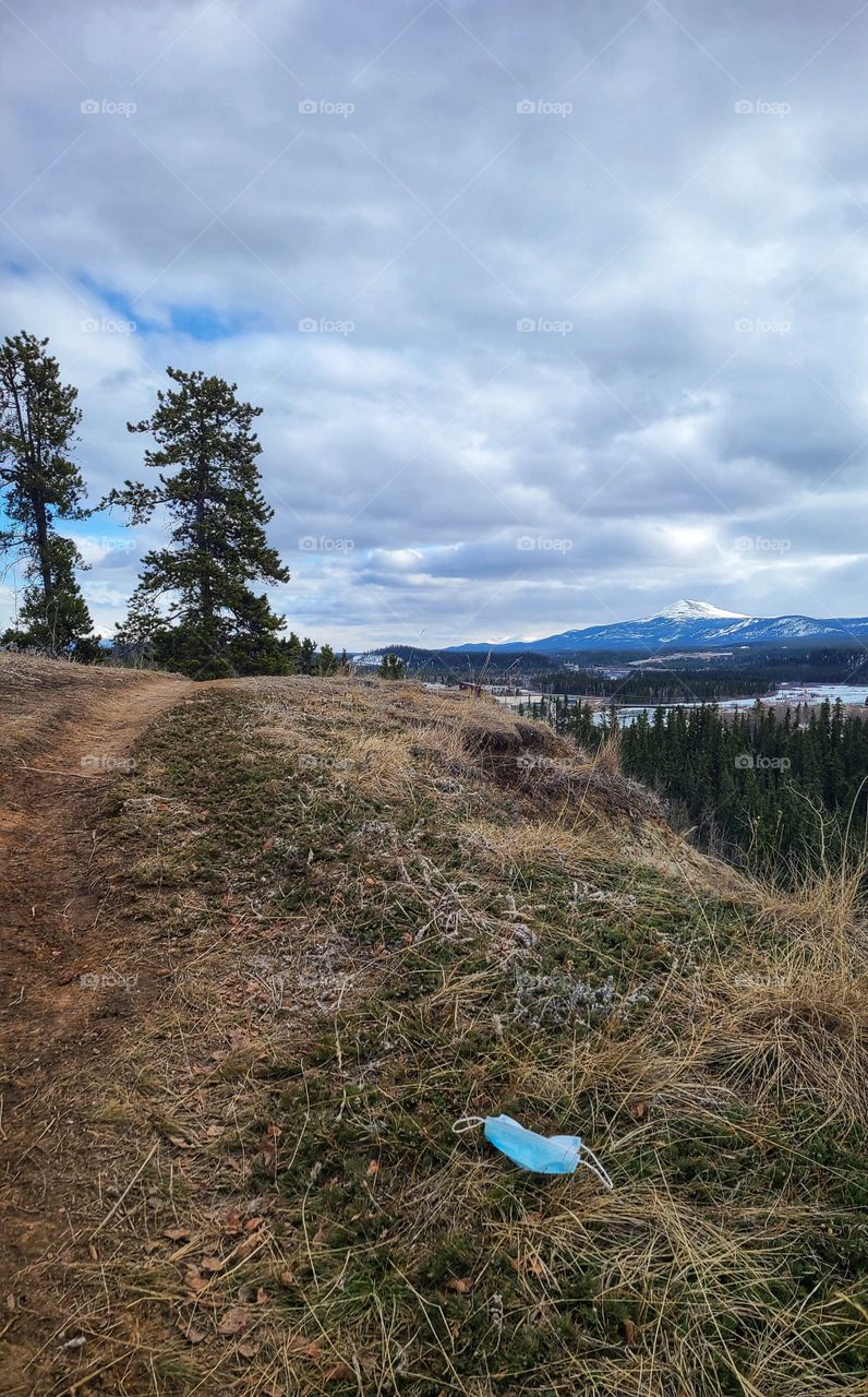 Masks littered on the mountainside