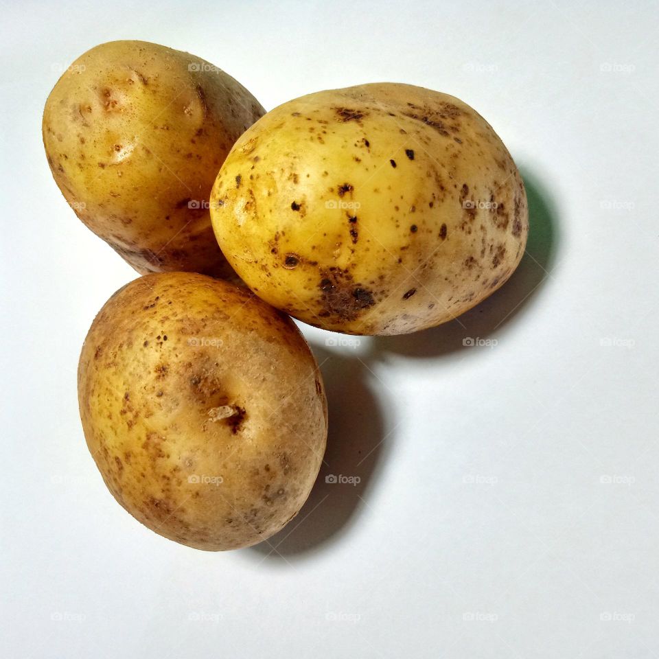 Fresh potatoes on the table