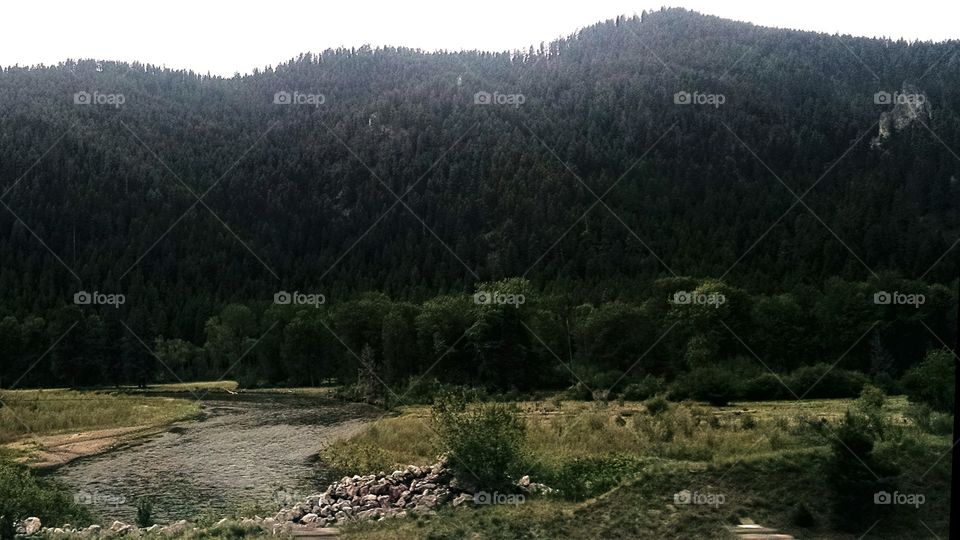 A River Runs Through It. A beautiful river in the countryside between Butte and Missoula, Montana.