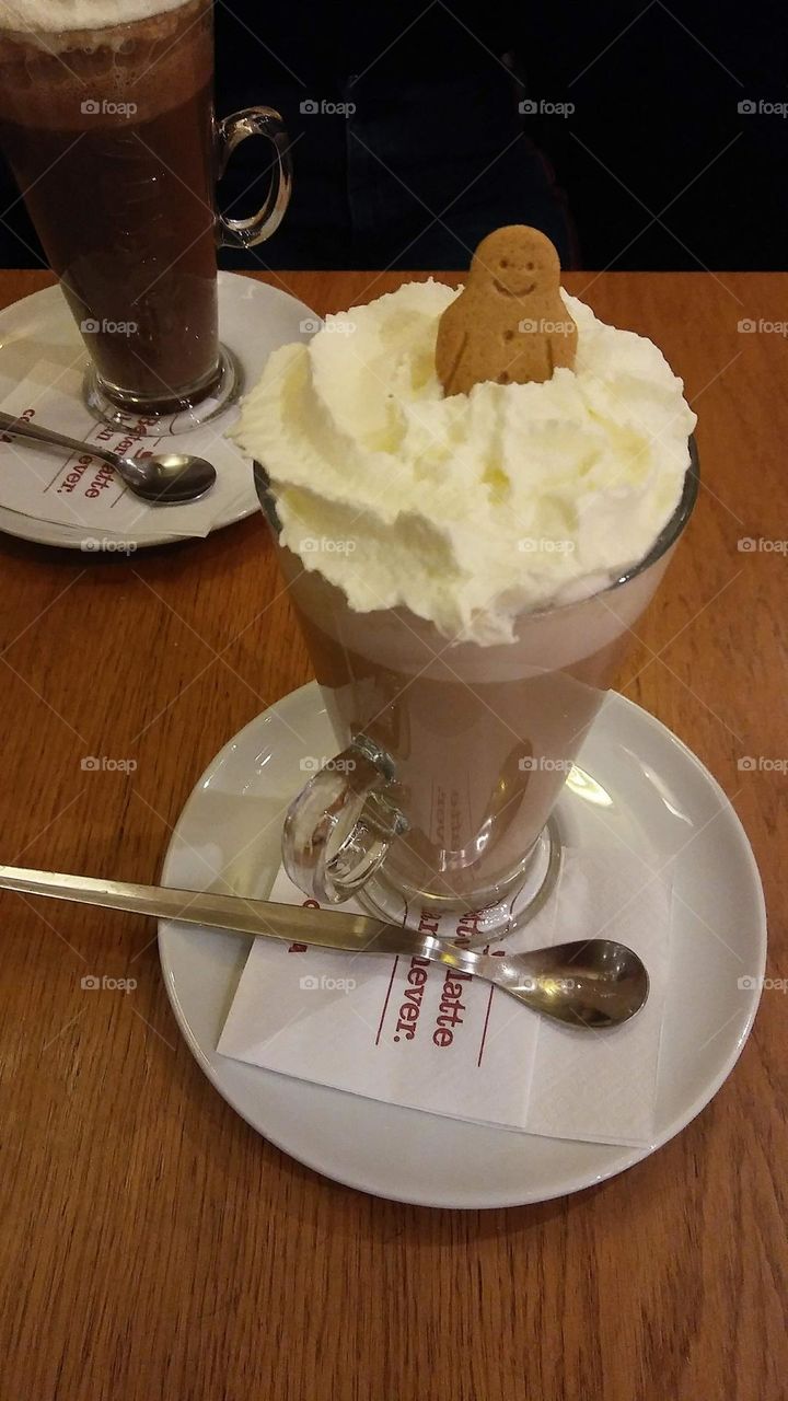 Ginger bread inside a nice cup of coffee.