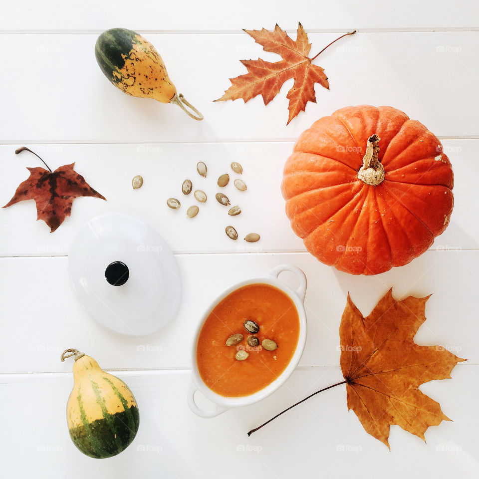 Autumn table still life of pumpkin soup and pumpkin