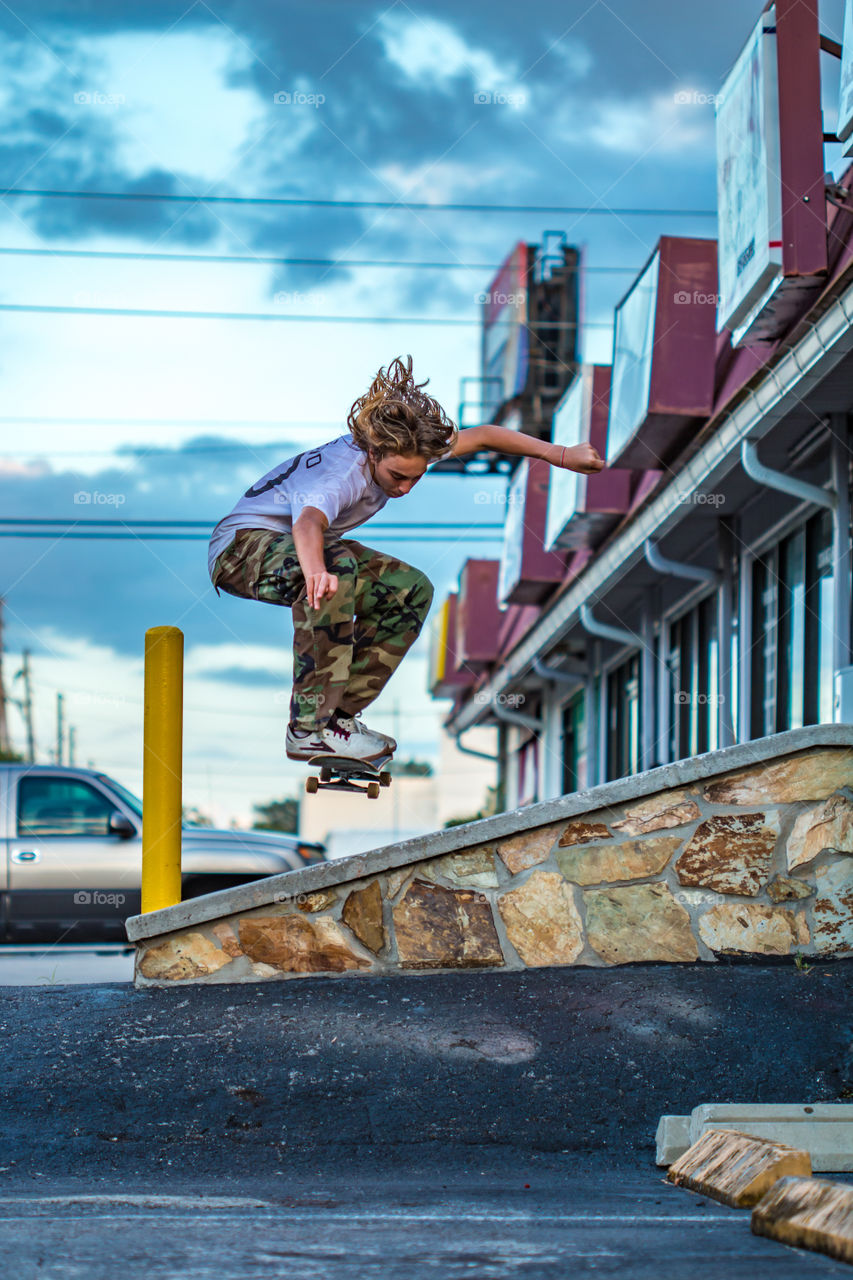 Skateboarder doing a Ollie 