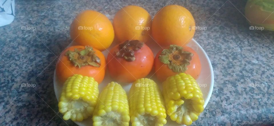 Kaka, orange and corn fruit set