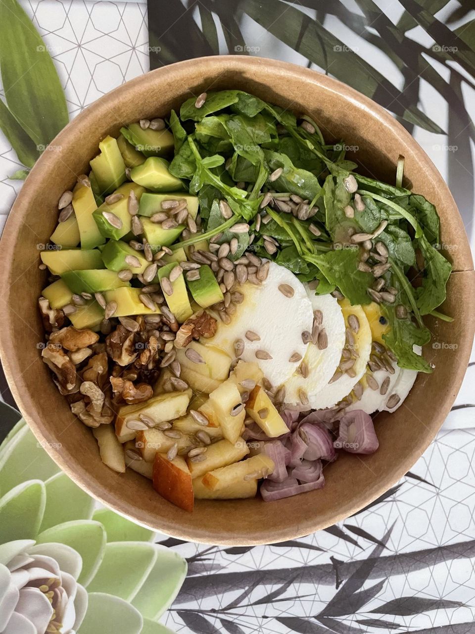 Poke bowl with mango avocado and salad