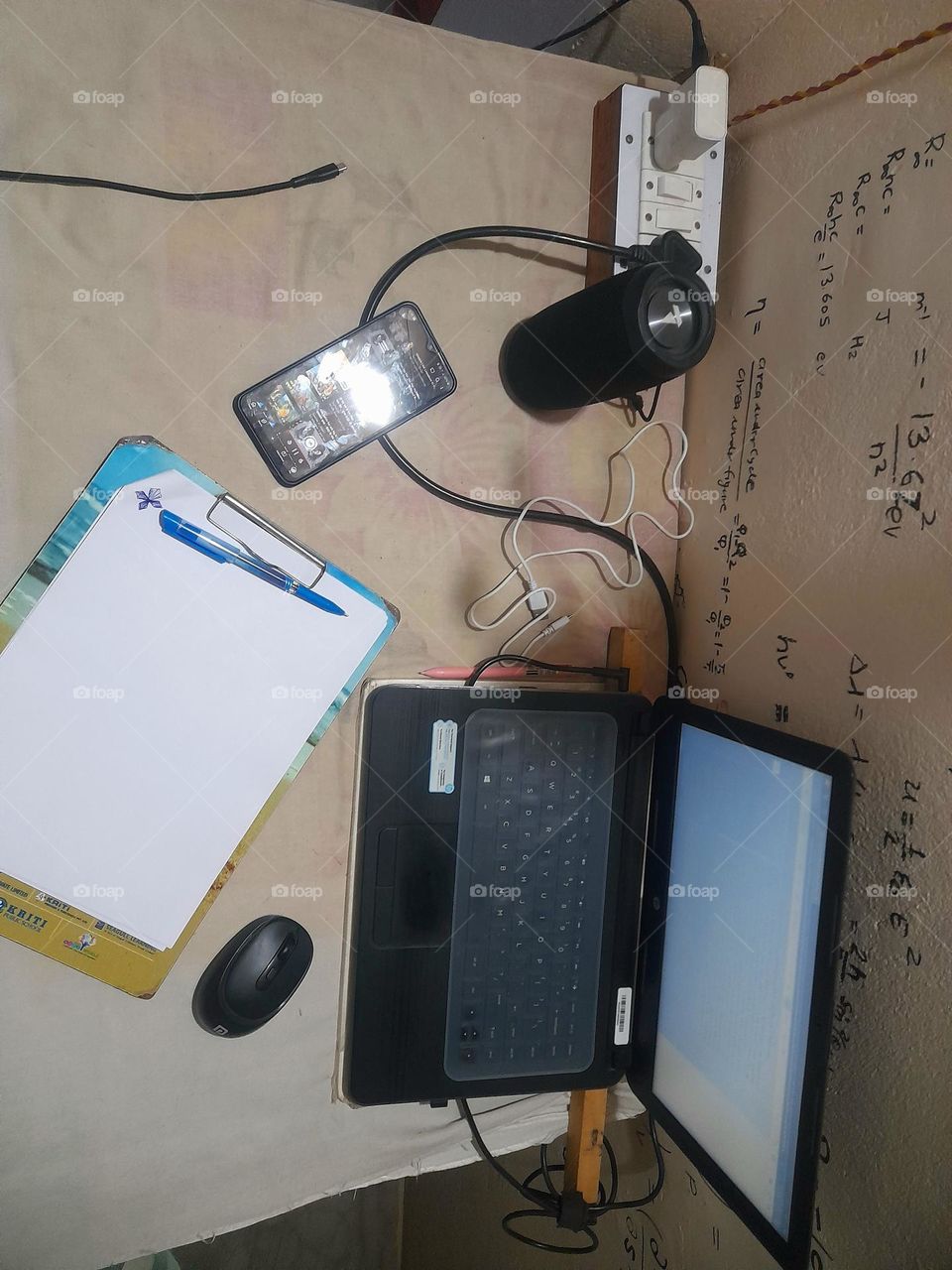 "A desk where I work is a space of focus and creativity, neatly organized with essential tools and a touch of personalization to inspire productivity and clarity.