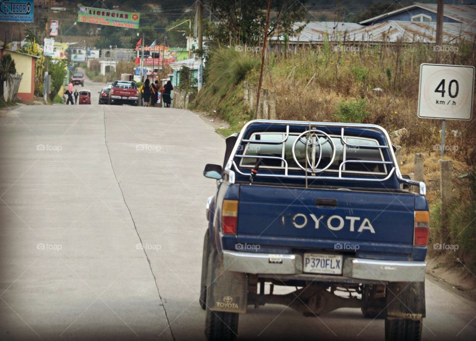 Toyota truck on typical road in Guatemala 