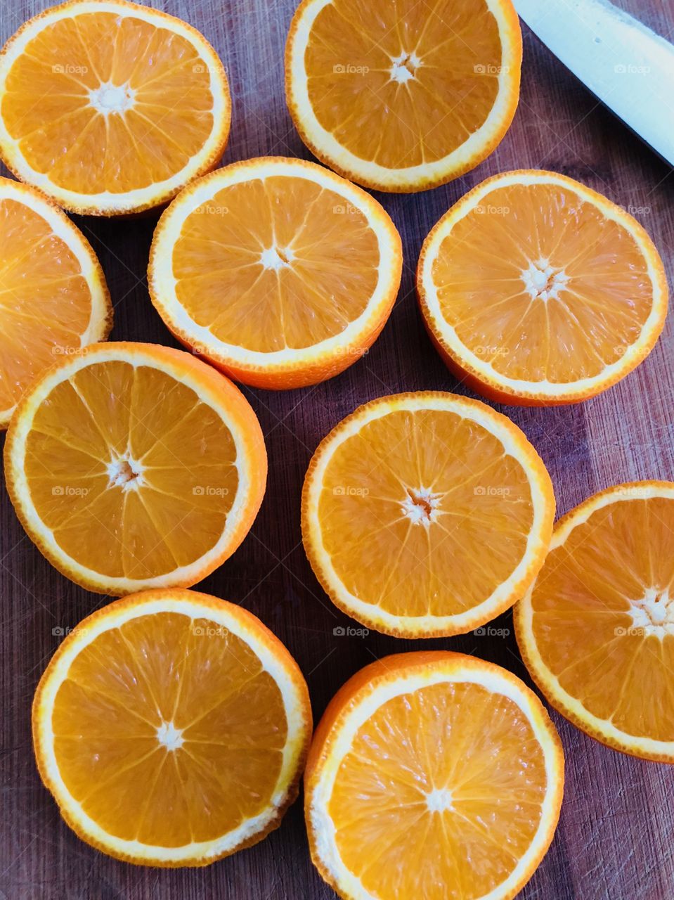 Fresh fruits: Orange Oranges cut in halves, ready for making freshly pressed juice.