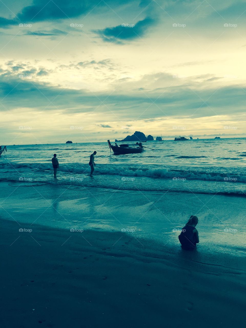 Silhouettes on a beach in Krabi, Thailand. 