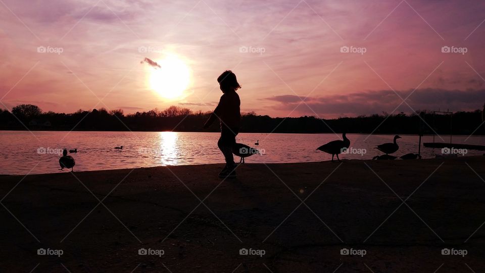 Young child silhoette on beach