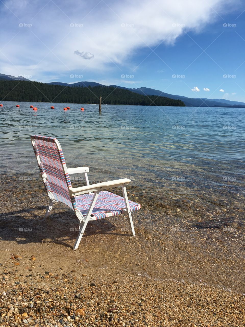 A Seat By The Sea.

Okay, it's actually a lake, but the name sounds better this way. Taken at Priest Lake in northern Idaho.