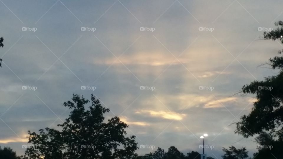 Sun's rays. Taking a walk and happened to be in the right place at the right time. This view lasted all of 3 minutes & then....gone!