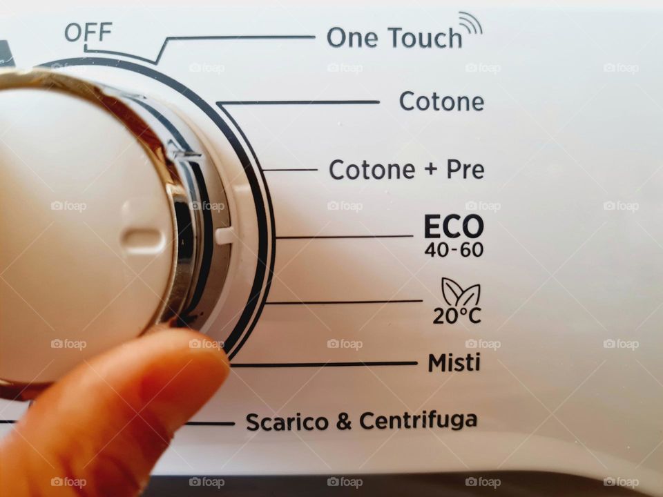 washing machine programmed for eco washing to save electricity