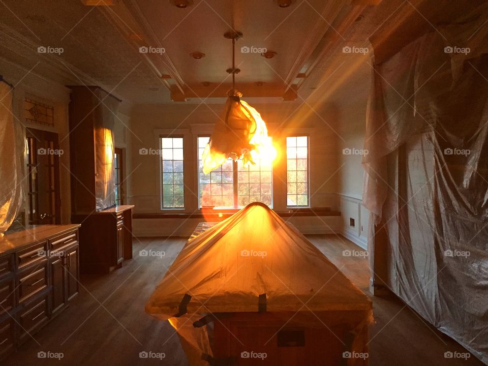 Washed golden light . Took this photo of the sunset in my kitchen during renovation 