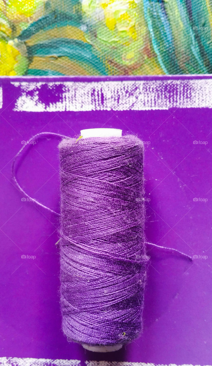 Purple thread on purple background