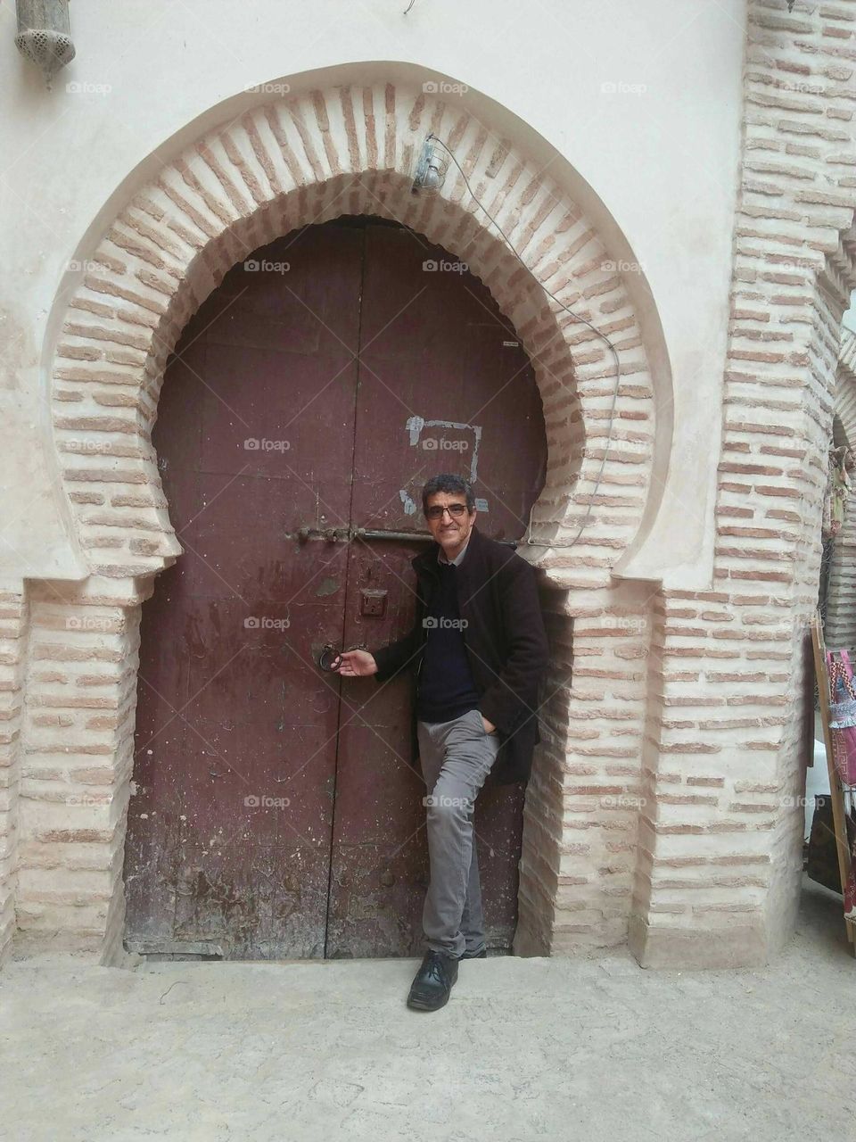 Im standing near an ancient door at marrakech city in Morocco