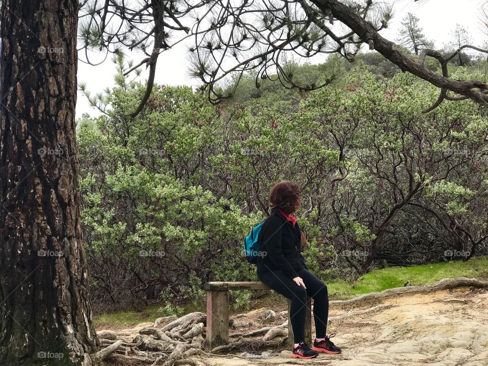 After a long hike we found a nice little bench! Snapped this picture of my mother :)