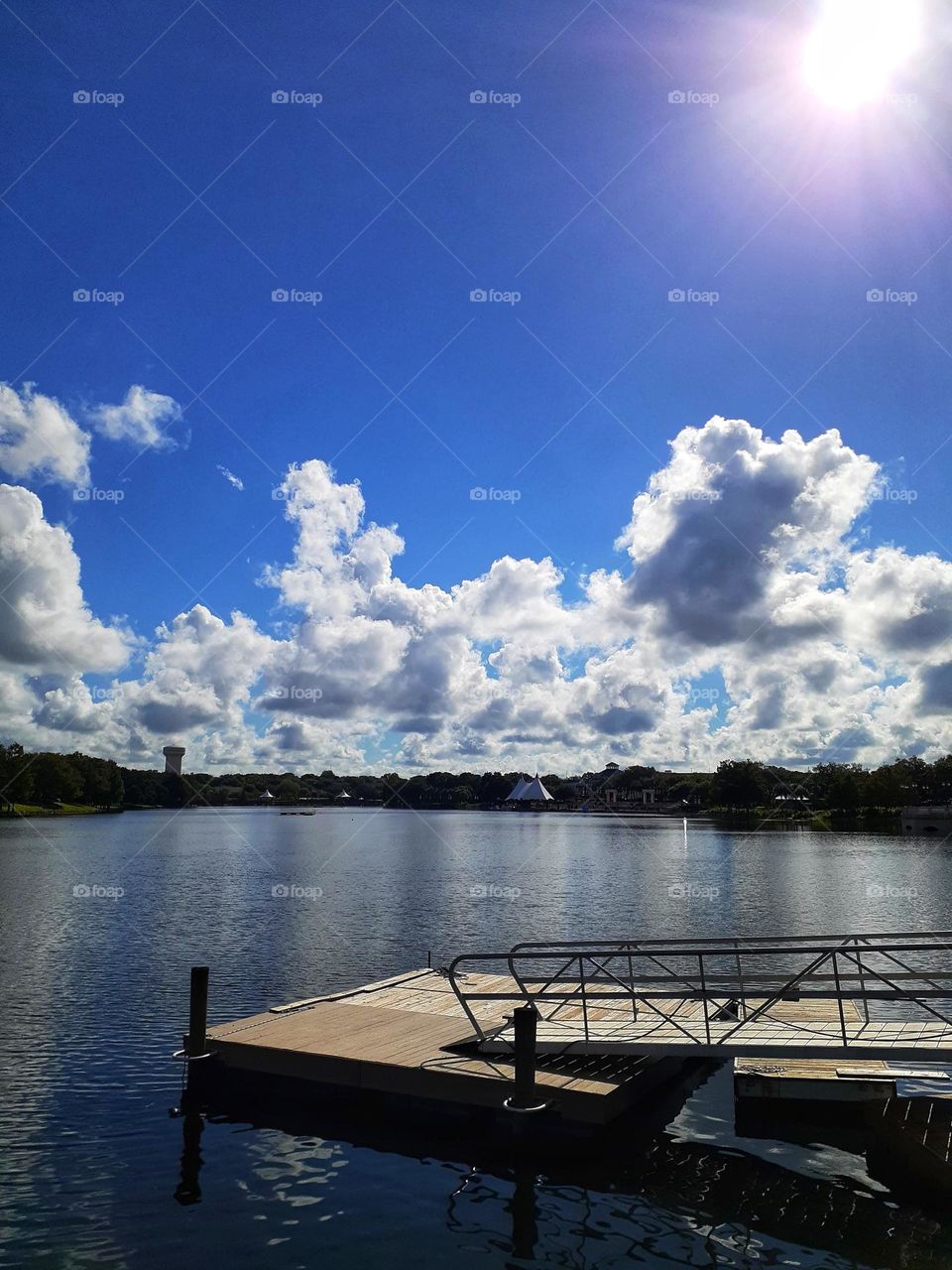 Blue sky and white clouds landscape over the lake at Cranes Roost Park in Altamonte  Springs, Florida.
