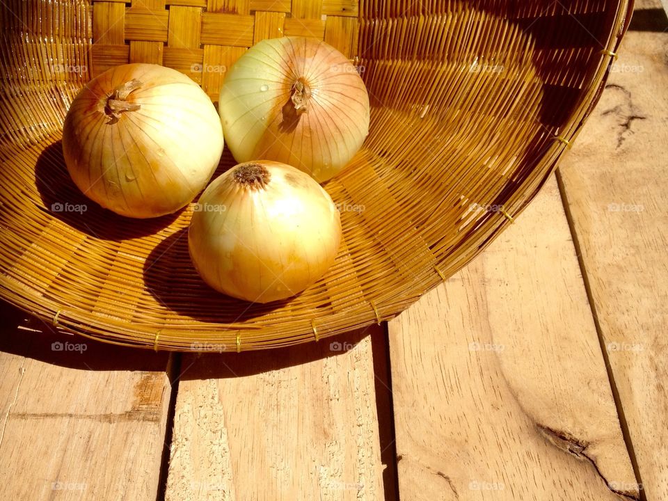 Onions . Onions in basket 