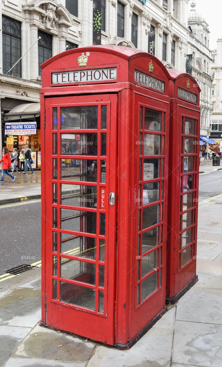 Red telephone boothnear in London.