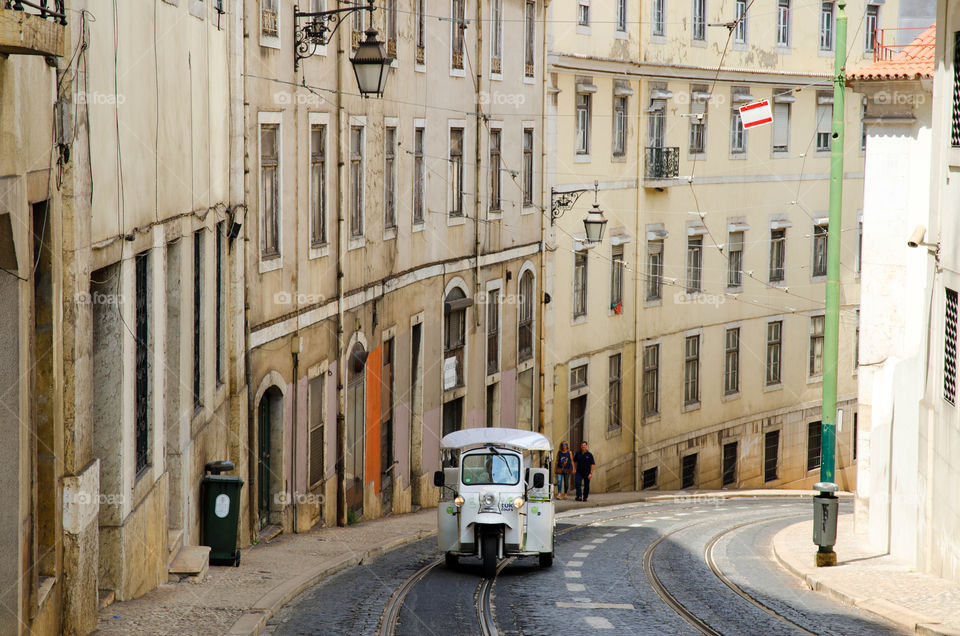 A tuk tuk in an old street of Lisbon, Portugal 