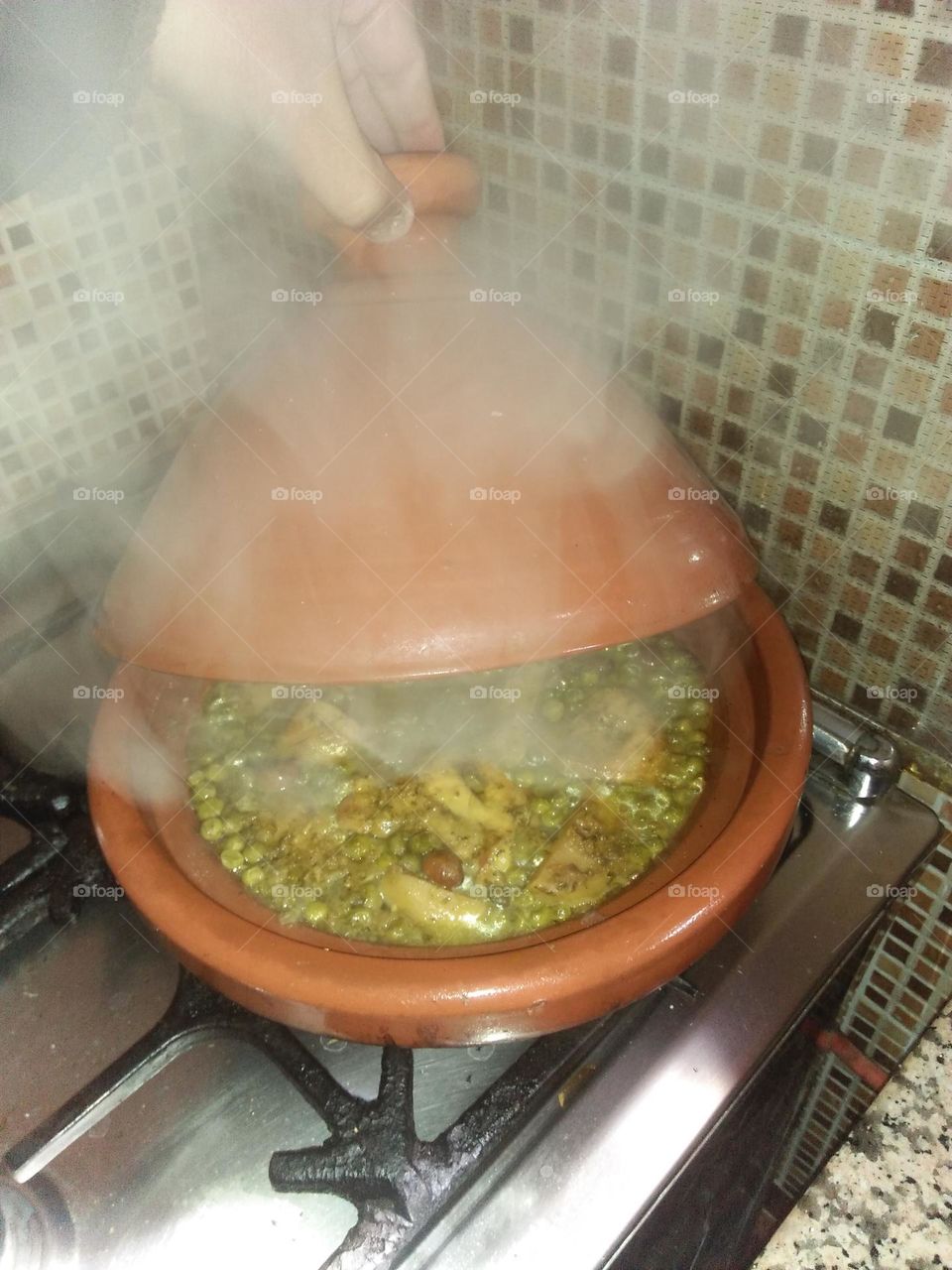 a smoke coming from moroccan Tajine.