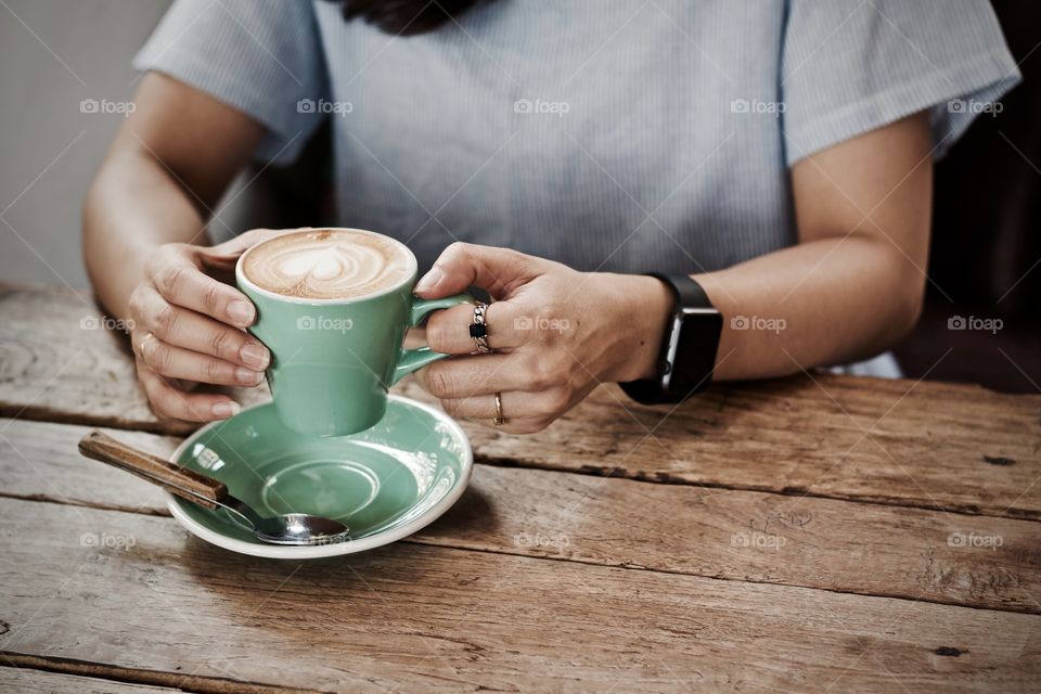 Women drinking coffee cup 