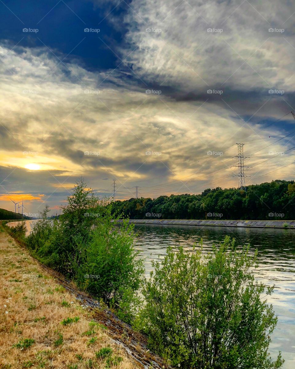 Dramatic sunset over a canal