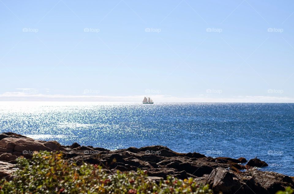 ship at sea . walking the shore and saw a ship 