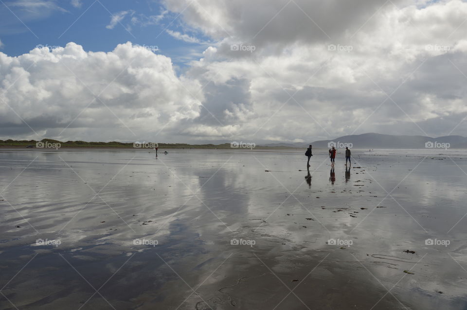 People standing on beach